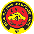 Studios Unis d'Auto-Défense Logo
